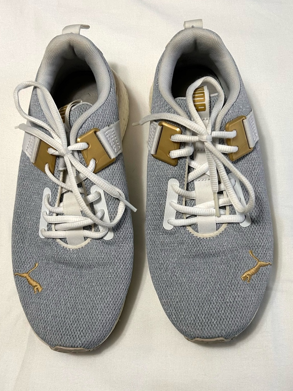 Puma Women’s sz 9.5 Light Blue and Gold Low-Top Sneakers Excellent condition